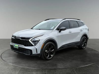 2025 Kia Sportage — rear three-quarter view