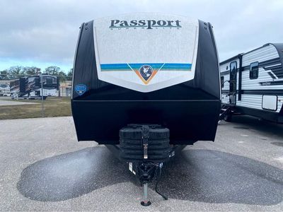 2025 KEYSTONE RV PASSPORT — rear three-quarter view