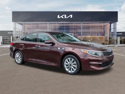 2018 Kia Optima EX in Sangria — front three-quarter view