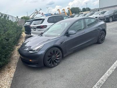 2021 Tesla Model 3 — side profile view