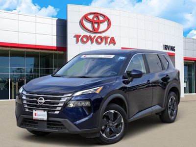 2024 Nissan Rogue SV in Blue — front three-quarter view