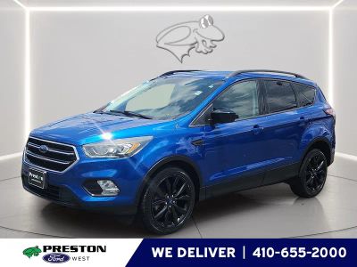 2017 Ford Escape SE in Lightning Blue — front three-quarter view