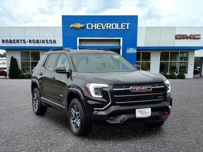 2026 GMC Terrain AT4 in Ebony Twilight Metallic — front three-quarter view