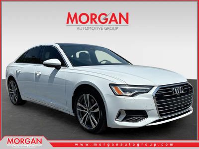 2023 Audi A6 Sedan Premium Plus in Glacier White Metallic — front three-quarter view