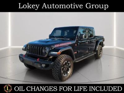 2024 Jeep Gladiator Rubicon in Black Clearcoat — front three-quarter view