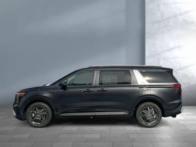 2026 Kia Carnival Hybrid — rear three-quarter view