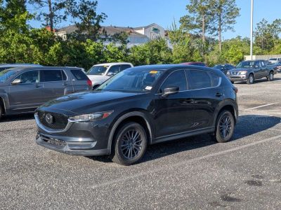 2020 Mazda CX-5 Touring in Black — front three-quarter view