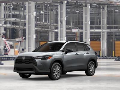2026 Toyota Corolla Cross LE in Sonic Silver — front three-quarter view