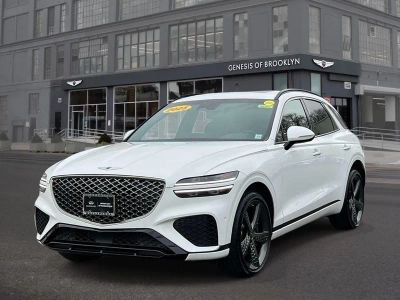 2025 Genesis GV70 3.5T Sport in Alta White — front three-quarter view