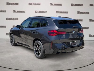 2026 BMW X3 — rear three-quarter view