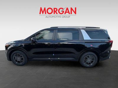 2026 Kia Carnival Hybrid — side profile view