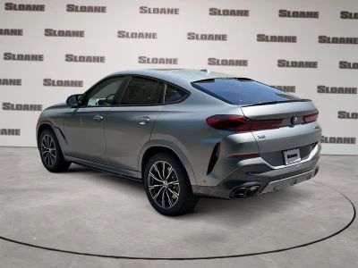 2027 BMW X6 — rear three-quarter view