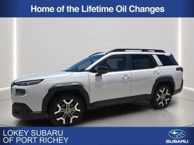 2026 Subaru Outback Touring XT in Crystal White Pearl — front three-quarter view
