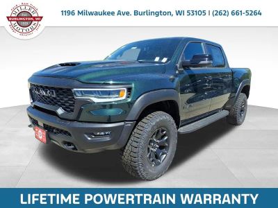 2026 RAM Ram 1500 RAM 1500 RHO CREW CAB 4X4 5'7' BOX in Serrano-Green Metallic Exterior Paint — front three-quarter view