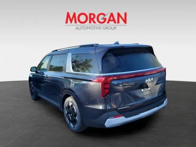 2026 Kia Carnival — rear three-quarter view