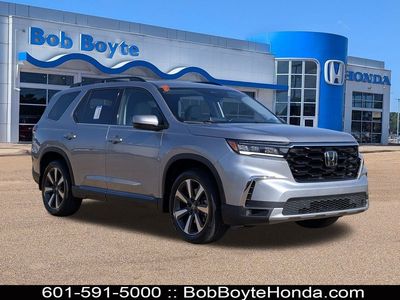 2024 Honda Pilot Touring in Lunar Silver Metallic — front three-quarter view