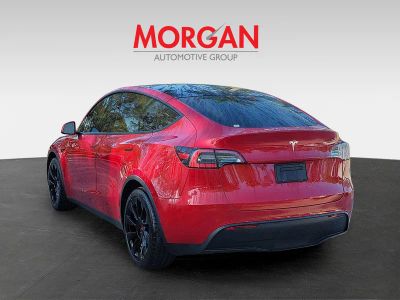 2021 Tesla Model Y — rear three-quarter view