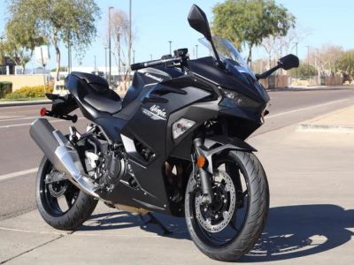 2026 Kawasaki Ninja 500 ABS Metallic Flat Spark Black — side profile view