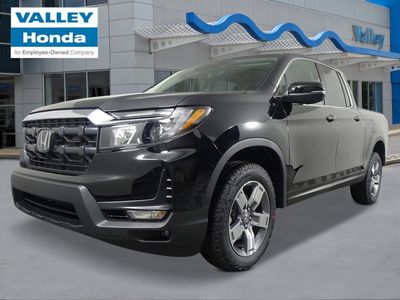 2026 Honda Ridgeline RTL in Crystal Black Pearl — front three-quarter view