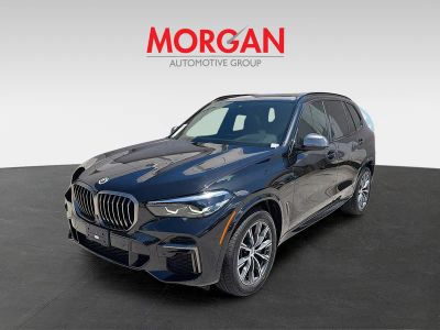 2023 BMW X5 — rear three-quarter view