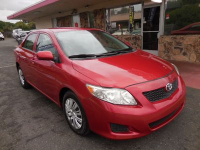 2009 Toyota Corolla in Red — front three-quarter view