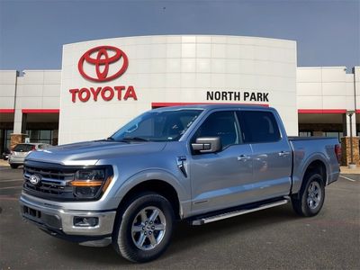 2024 Ford F-150 XLT in Iconic Silver Metallic — front three-quarter view