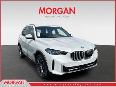2026 BMW X5 xDrive50e in White — front three-quarter view