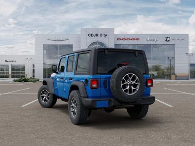 2026 Jeep Wrangler — rear three-quarter view