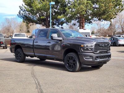 2026 RAM 3500 RAM 3500 LARAMIE CREW CAB 4X4 8' BOX in Granite Crystal Metallic Clear-Coat Exterior Paint — front three-quarter view
