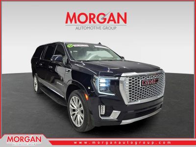 2022 GMC Yukon XL Denali in Midnight Blue Metallic — front three-quarter view