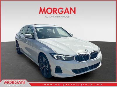 2024 BMW 3 Series 330i xDrive in Alpine White — front three-quarter view