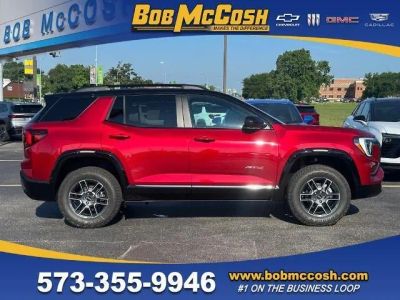 2026 GMC Terrain AT4 in Volcanic Red Tintcoat — front three-quarter view