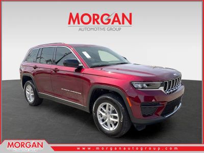 2026 Jeep Grand Cherokee Laredo X in Red — front three-quarter view