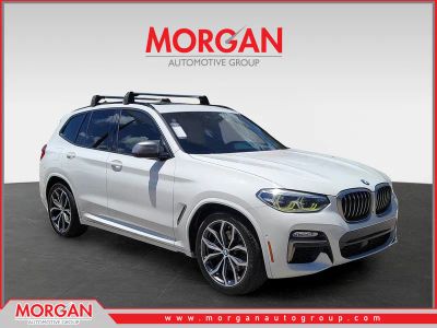 2018 BMW X3 M40i in Alpine White — front three-quarter view