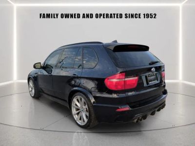 2010 BMW X5 M — rear three-quarter view