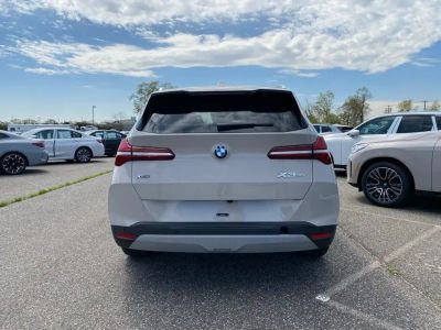 2026 BMW X3 — rear three-quarter view