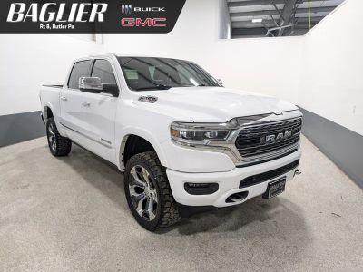 2020 RAM 1500 Limited Crew Cab 4x4 5'7" Box in White — front three-quarter view