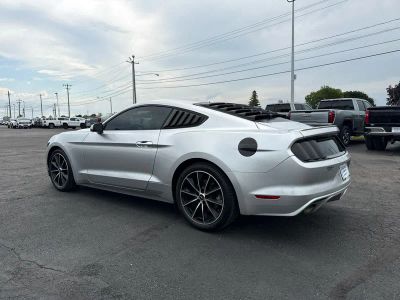2015 Ford Mustang — rear three-quarter view