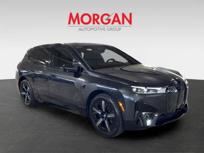 2025 BMW iX — side profile view