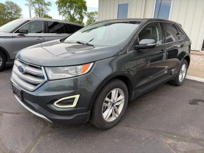2015 Ford Edge SEL AWD in Guard Metallic — front three-quarter view