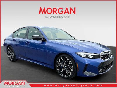 2025 BMW 3 Series M340i in Portimao Blue Metallic — front three-quarter view