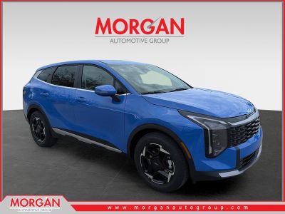2026 Kia Sportage EX in Nebular Blue — front three-quarter view