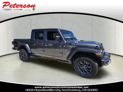 2026 Jeep Gladiator GLADIATOR 85TH ANNIVERSARY EDITION 4X4 in Granite Crystal Metallic Clear-Coat Exterior Paint — front three-quarter view