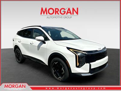 2026 Kia Sportage Hybrid EX in White — front three-quarter view