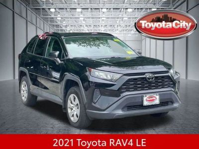 2021 Toyota RAV4 LE in Midnight Black Metallic — front three-quarter view