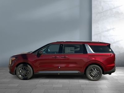 2026 Kia Carnival Hybrid — rear three-quarter view
