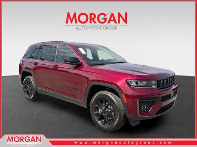 2026 Jeep Grand Cherokee Laredo Altitude in Red — front three-quarter view
