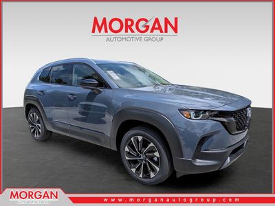2026 Mazda CX-50 Hybrid Premium Plus in Gray — front three-quarter view