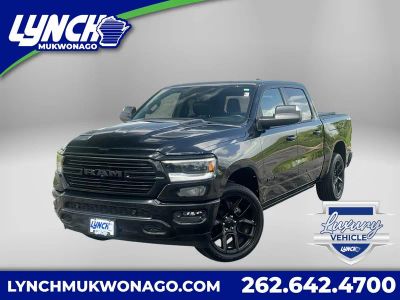 2024 RAM 1500 Laramie GT in Diamond Black Crystal Pearlcoat — front three-quarter view