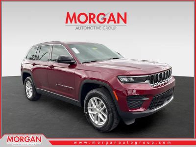 2026 Jeep Grand Cherokee Laredo in Red — front three-quarter view